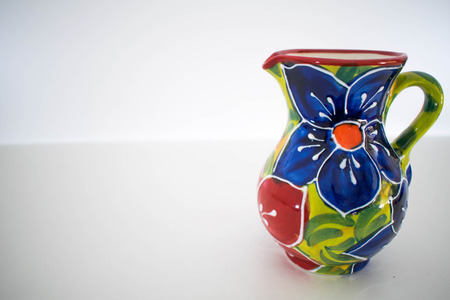 a colourful ceramic jug at one edge of the photo from Marbella, Spainの写真素材