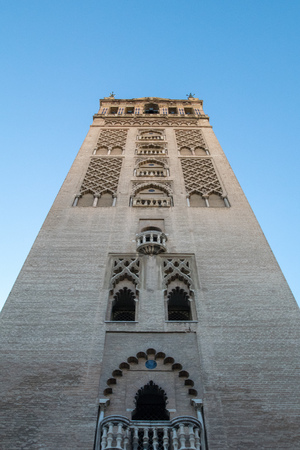 interesting angles at the base of a church tower in Seville,Spainの写真素材