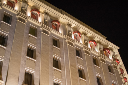 beautiful architecture lit up at night in Seville, Spainの写真素材
