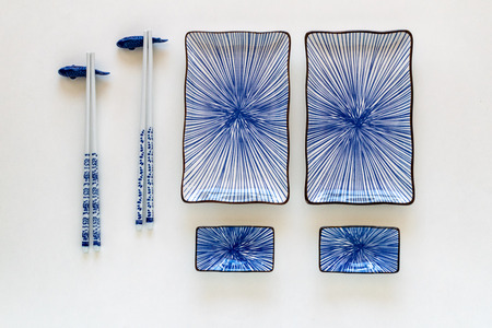 a pair of blue ceramic sushi plates meal set upの写真素材
