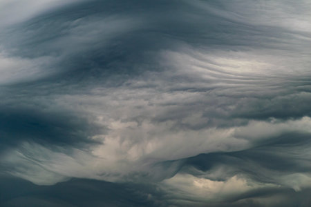 a close up image of grey storm clouds over the Mediterranean seaの写真素材