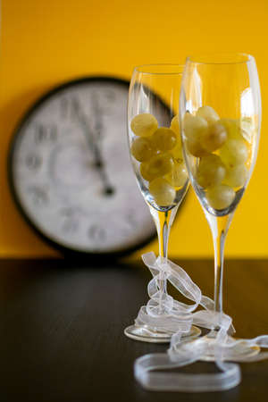Getting ready for the Spanish tradition of eating twelve grapes during the last twelve seconds of the old year on new years eveの写真素材