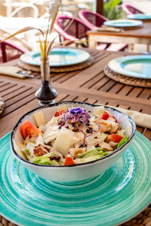 a restaurant in Marbella serving a mediterranean chicken Caeser saladの写真素材