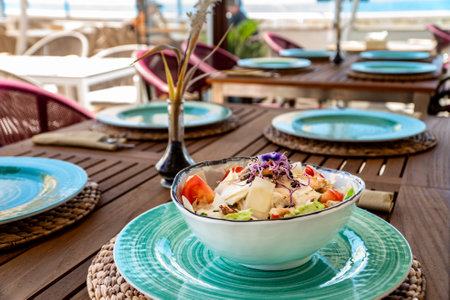 an image of a freshly prepared chicken Caesar saladの写真素材