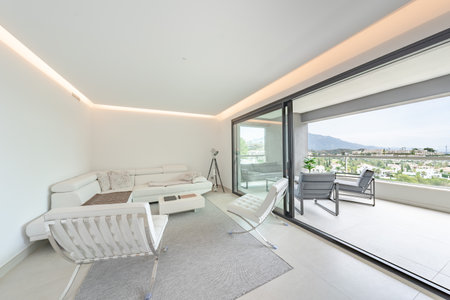 an image of a luxury living room with open terrace and views over Marbellaの写真素材