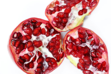 fresh cracked pomegranate seedsの写真素材