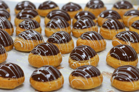 chocolate eclair preparation, also known as chocolate profiteroles