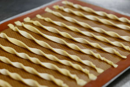 lavash bread sticks in baking tray for cook