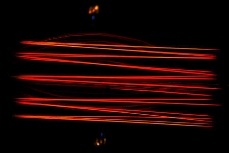 incandescent light bulb with a wire filament, The filament is enclosed in a glass bulb with a vacuum or inert gas to protect the filament from oxidation.の写真素材