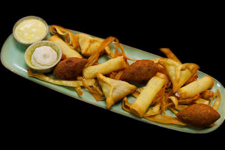 lebanese arabic food speciality deep fried hot mezze selection includes spinach fatayer, cheese rolls and lamd kebbeの写真素材
