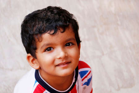 three year age indian baby boy in close up with backgroundの写真素材