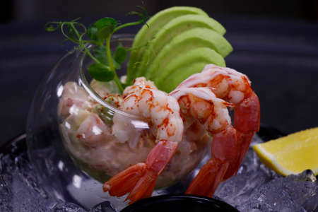 shrimps or prawns cocktail with marie rose dressing and avocado on iceの写真素材