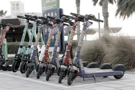 Dubai, United Arab Emirates - Auguest 30  2022 dubai rta department leisure activity with bicycle and electric motor bike exercise in kite beachのeditorial素材