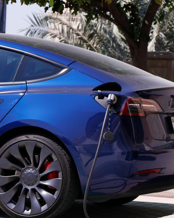 Dubai, United Arab Emirates - October 16, 2022 tesla car charging in an electric stationのeditorial素材