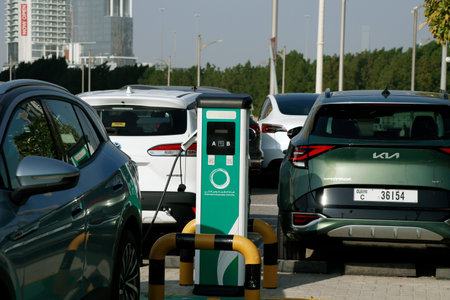 Dubai, United Arab Emirates - January 10, 2023 electric car charging station in a public parking provided by dubai water and electricity authorityのeditorial素材