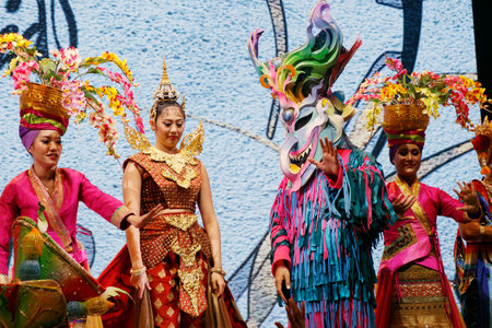Dubai, United Arab Emirates - March 15, 2022 thai traditional dancers with colorful authentic costume in a stageのeditorial素材