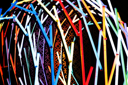 rainbow lighting led tubes with black backgroundsの写真素材