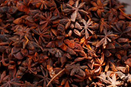 star anise, Illicium verum is a medium-sized evergreen tree native to northeast Vietnam and South China, star shaped spicesの写真素材