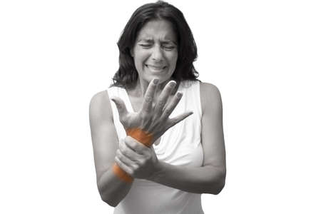 Wrist pain. A middle-aged woman with muscle and bone pain in different parts of the bodyの写真素材
