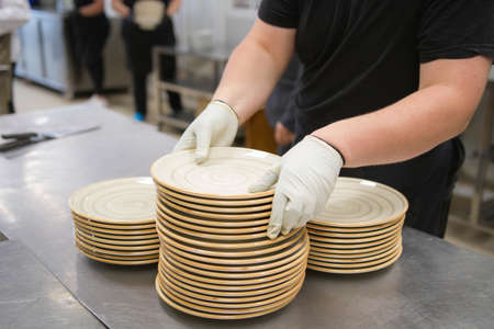 Elaboration of design dishes. Scenes of real teamwork by great Spanish professionals of gourmet haute cuisine for social eventsの写真素材