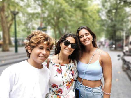 Portrait of a happy united spanish family enjoying the holidaysの写真素材