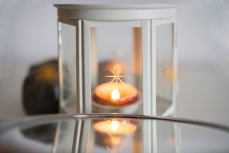 Still life copy space christmas home motif. candle, flame