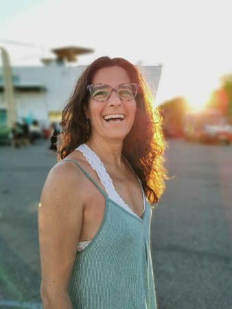 Attractive happy middle-aged woman with glassesの写真素材