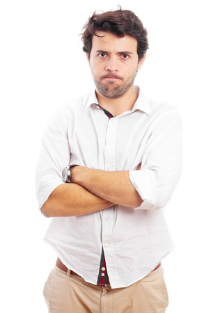 angry man with arms crossedの写真素材