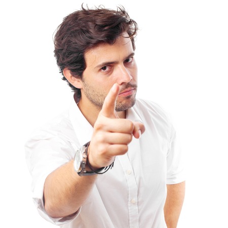 young man pointing youの写真素材