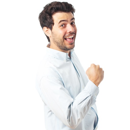 young winner happy man on a white backgroundの写真素材
