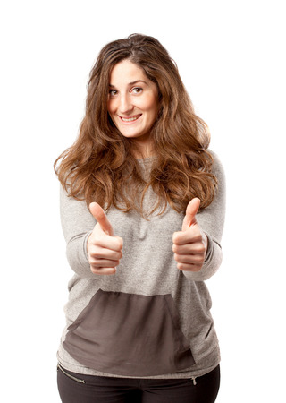 Young curvy woman over whiteの写真素材