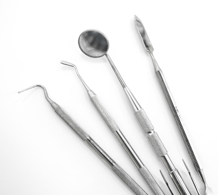 Dentist tools isolated on whiteの写真素材