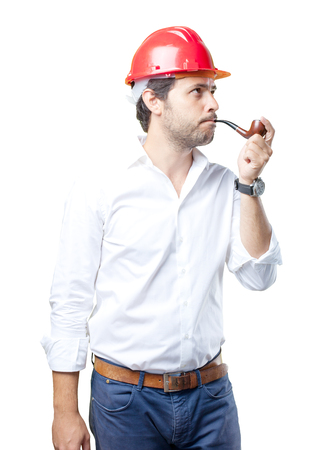 Young architect working over white backgroundの写真素材