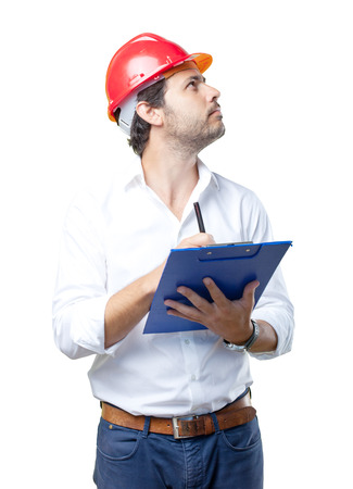 Young architect working over white backgroundの写真素材