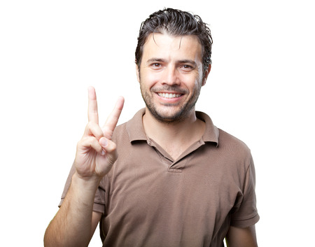 latin handsome gestures on whiteの写真素材