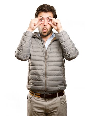Concerned man open his eyesの写真素材