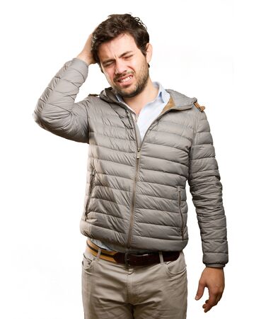 Young man doing a depression gestureの写真素材