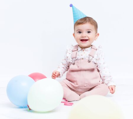 Baby birthday with ballonsの写真素材
