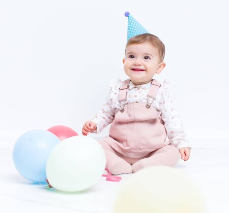 Baby birthday with ballonsの写真素材