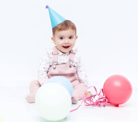 Baby birthday with ballonsの写真素材
