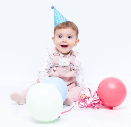 Baby birthday with ballonsの写真素材
