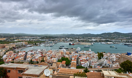 A Panoramic view of the port of ibiza on a cloudy dayのeditorial素材
