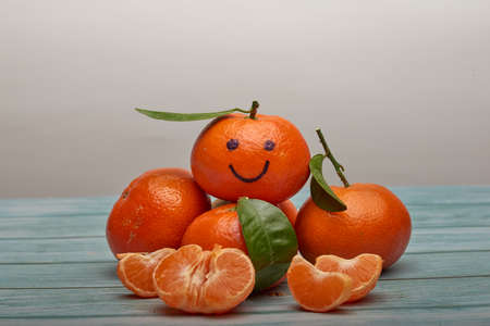 A nice and juicy tangerine rich in vitamin C.の写真素材