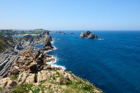 A beautiful view of whimsical rock formations on cliffs in northern Spain.の写真素材