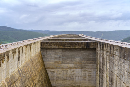 Road under construction between the green mountains of Madrid, Spain.の写真素材