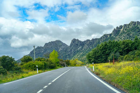 Curvy mountain road that goes to the rocky peaks, Guadarrama Madrid.