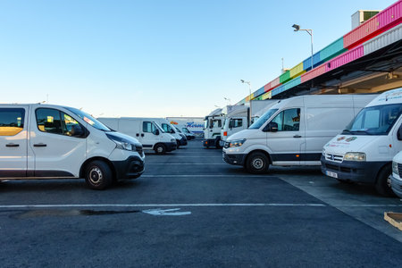Mercamadrid, Madrid, Spain - June 7, 2022: vehicles parked in the central fruit market of Madrid.のeditorial素材