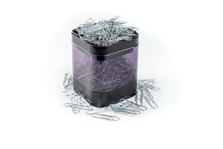 Container for clips in black and transparent color on isolated white background.