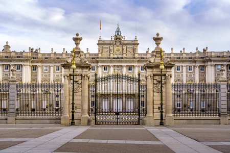 Front gate of the royal palace of Madrid, panoramic view of the building in its main facade. Spain.のeditorial素材