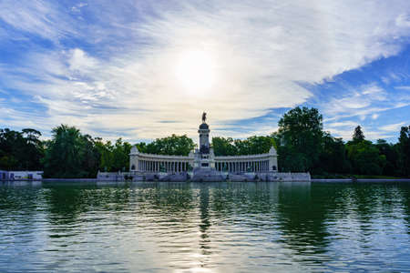 Lake of the Retiro Park in Madrid, in cloudy summer at sunrise.の写真素材